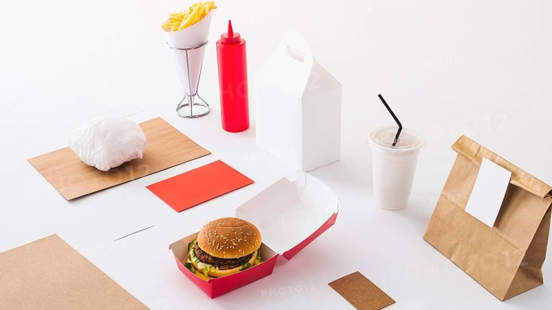 Fast food disposal cup sauce bottle parcel white background