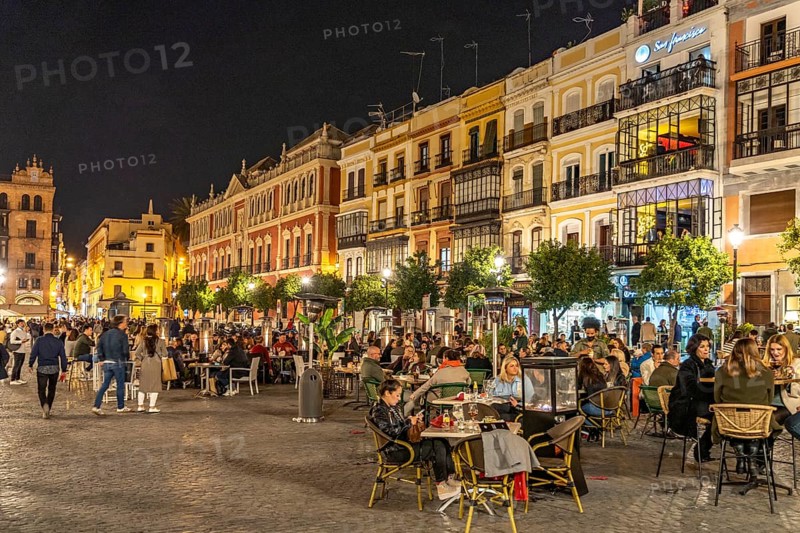 Crowded restaurants and bars in Plaza de San Francisco square at night