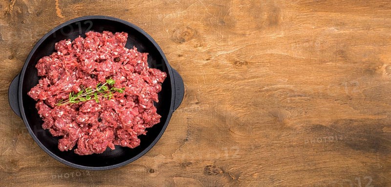 Top view meat with herbs copy space