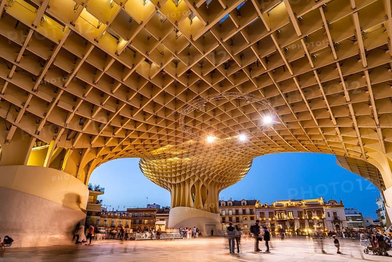 The futuristic wooden construction and observation deck Metropol Parasol at the Plaza de la Encarnacion at dusk