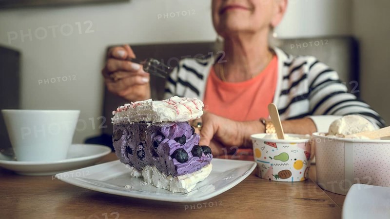 In a cafe. Colorful cake