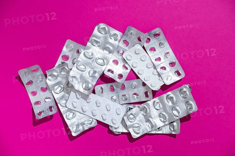 Empty tablet blister pack against a monochrome background