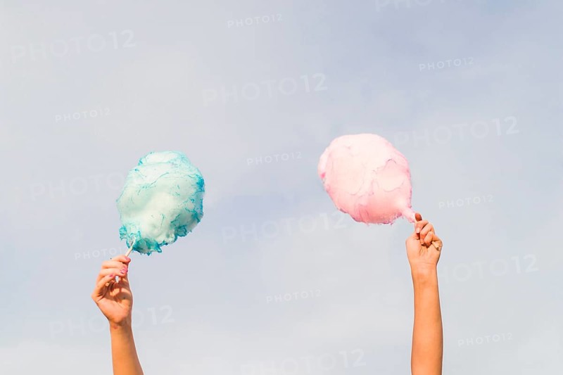 Hands holding cotton candy