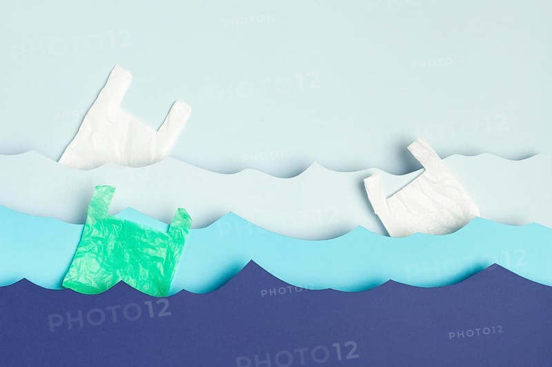 Top view paper ocean waves plastic bags