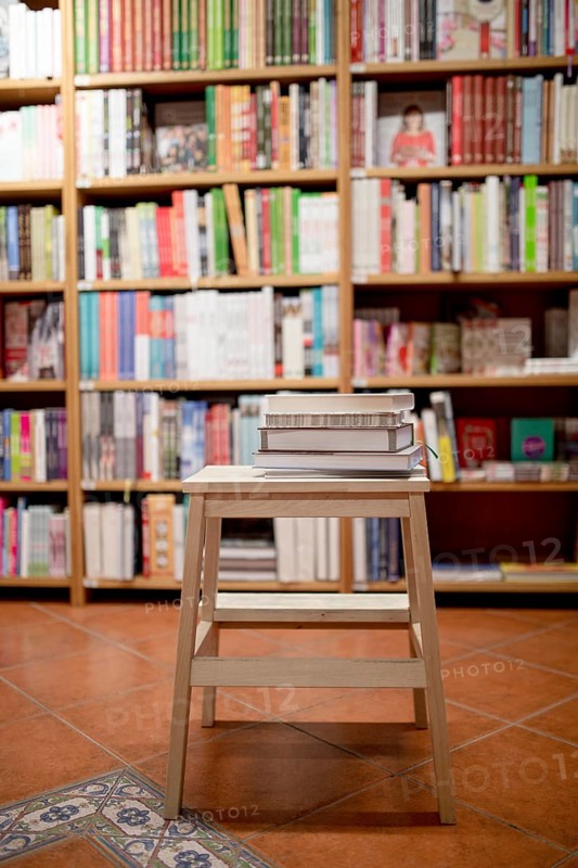 Books lying ladder bookstore