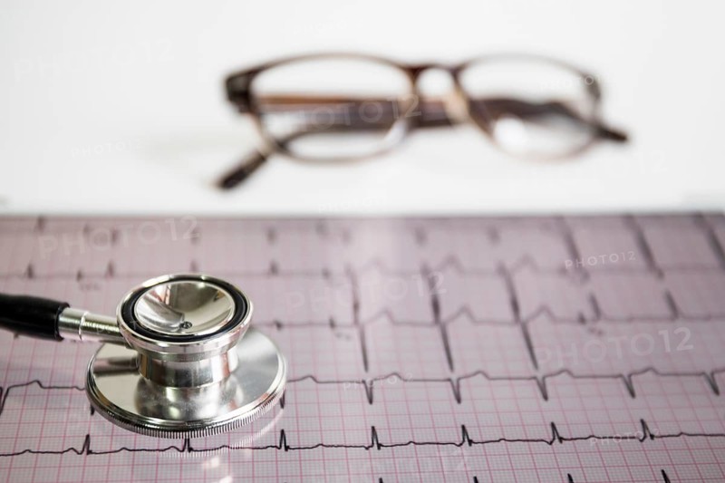Stethoscope cardiogram with eyeglasses
