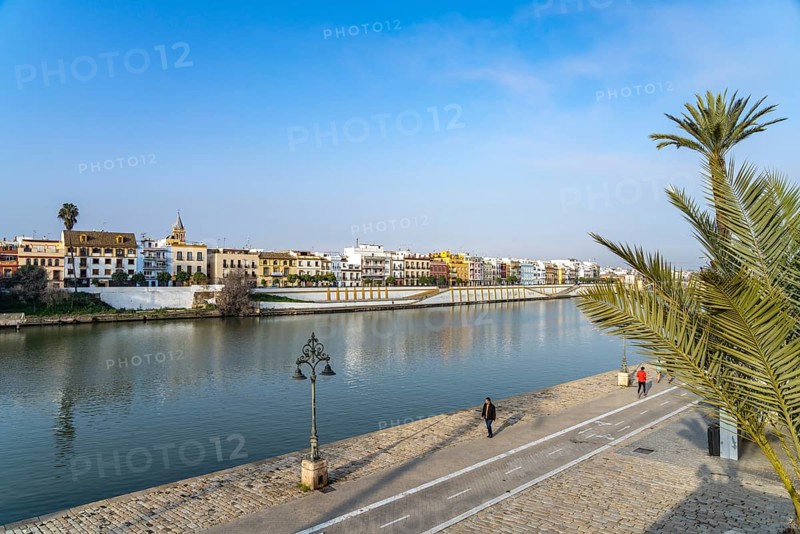 Waterfront and the colourful houses of the Triana district on the Guadalquivir River