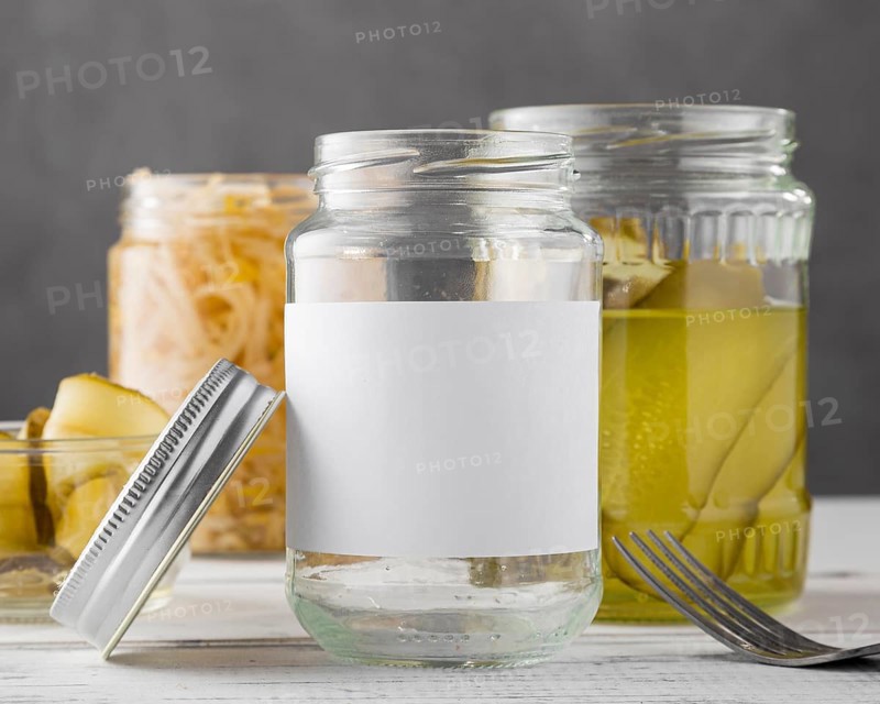 Front view pickled vegetables clear jars