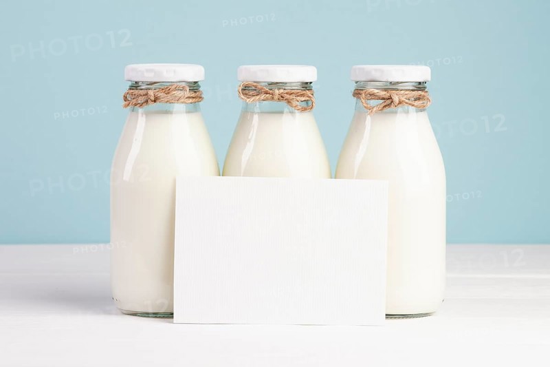 Milk bottles copy space card