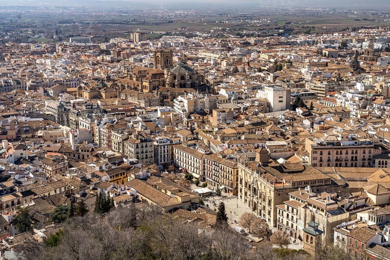 View of the old town with the Plaza Nueva square and cathedral in Granada