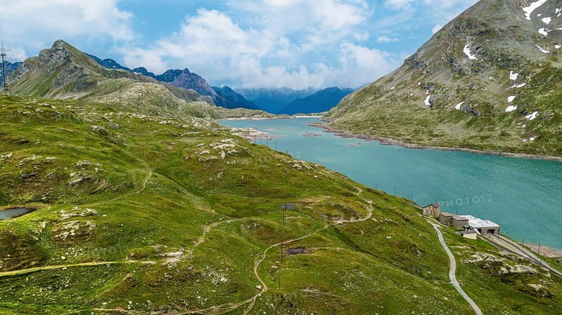 Aerial view Bird's eye view of mountain lake at mountain pass Alpine pass alpine mountain road Alpine road pass road Bernina Pass Bernina Pass