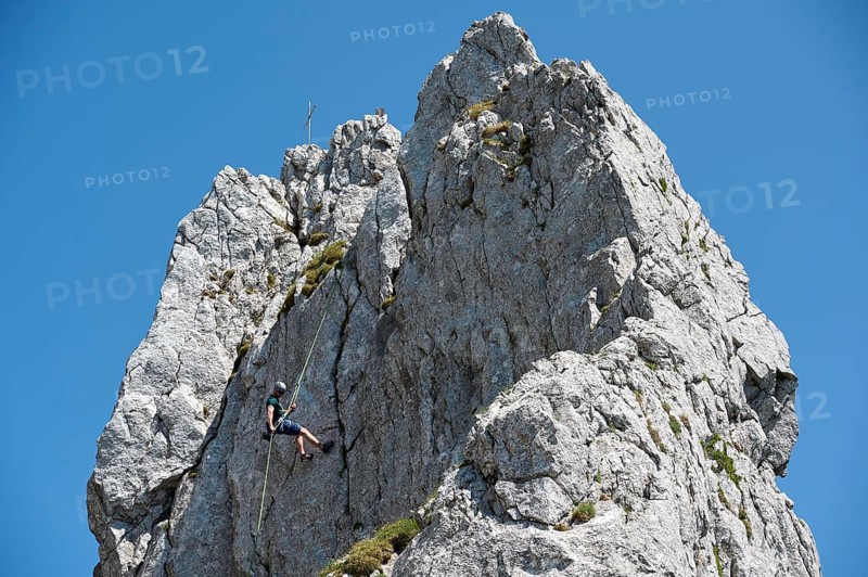 Climber abseiling on the Rossstein Needle