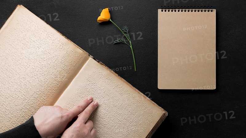 Fingers reading book