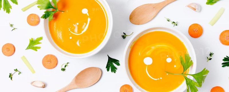 Top view delicious pumpkin soup table