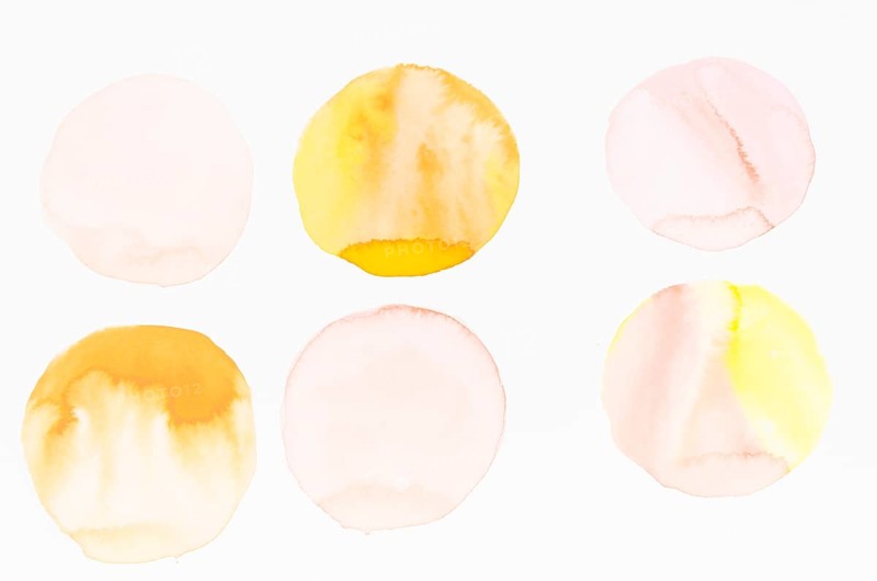 Watercolor circle brushstrokes design white backdrop