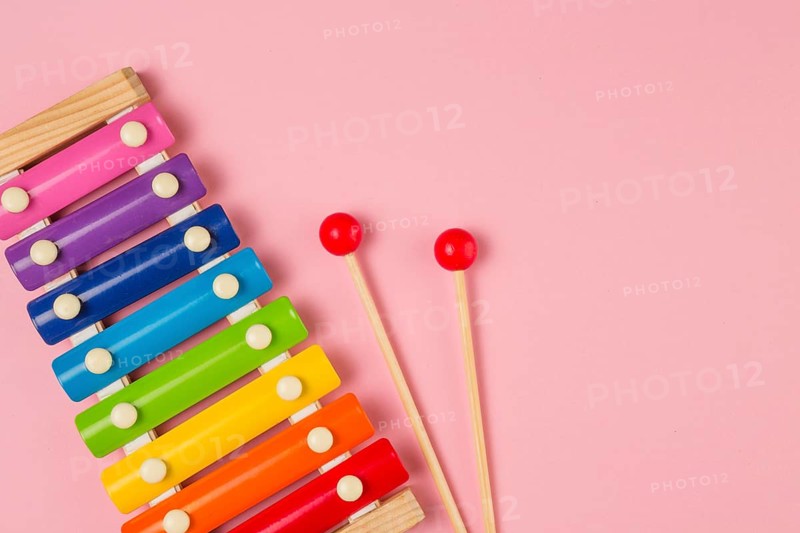 Flat lay colorful xylophone baby shower