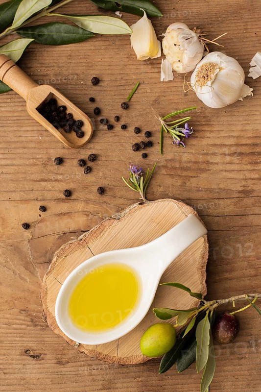 Flat lay olive oil garlic pepper