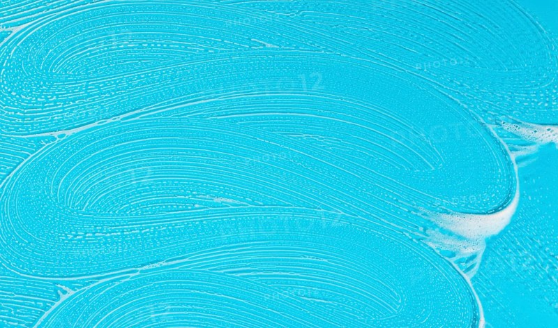 Flat lay soap foam blue background