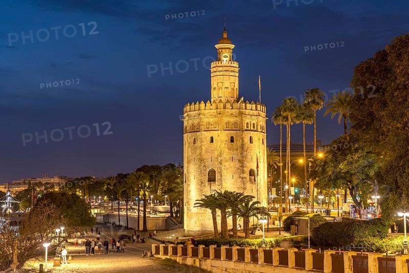 The historic Torre del Oro tower at dusk