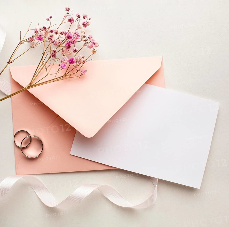 Pink flowers envelope save date wedding concept