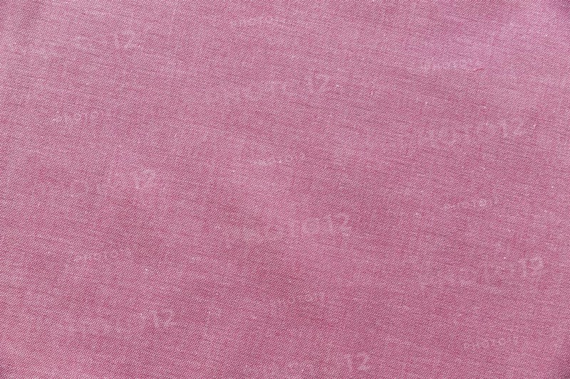 Elevated view pink textile background