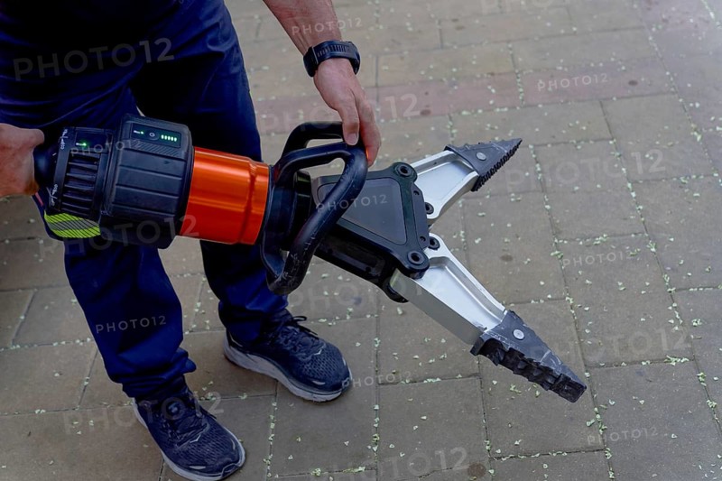 Firefighter with a spreader