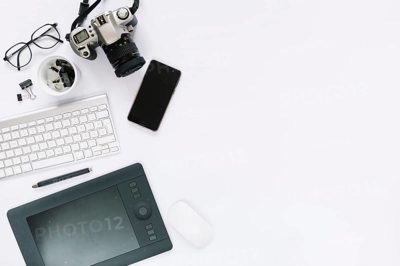 Digital camera graphic digital tablet keyboard mouse cellphone white background
