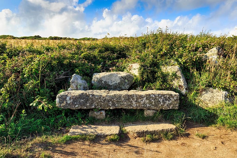 Stone bench by the wayside