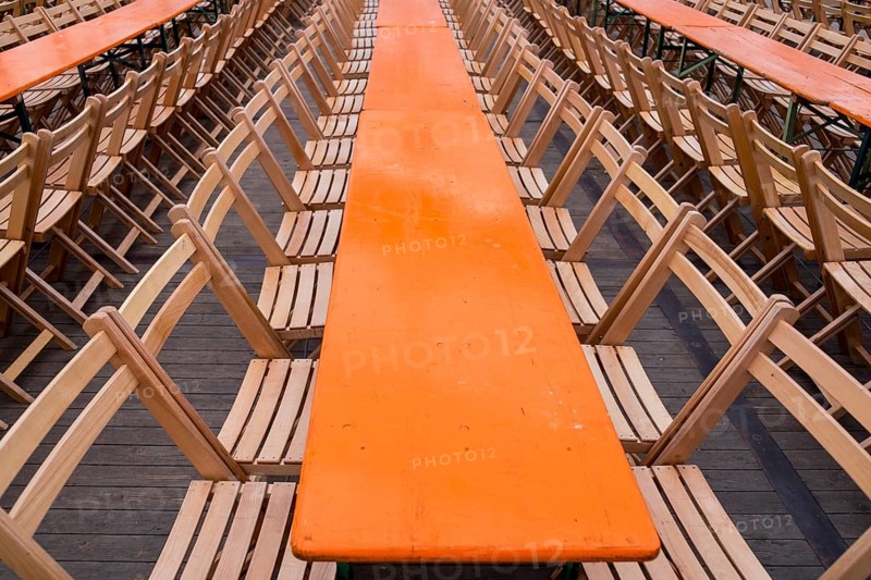 Empty rows of chairs and tables in a beer tent at the Rheinkirmes in Duesseldorf