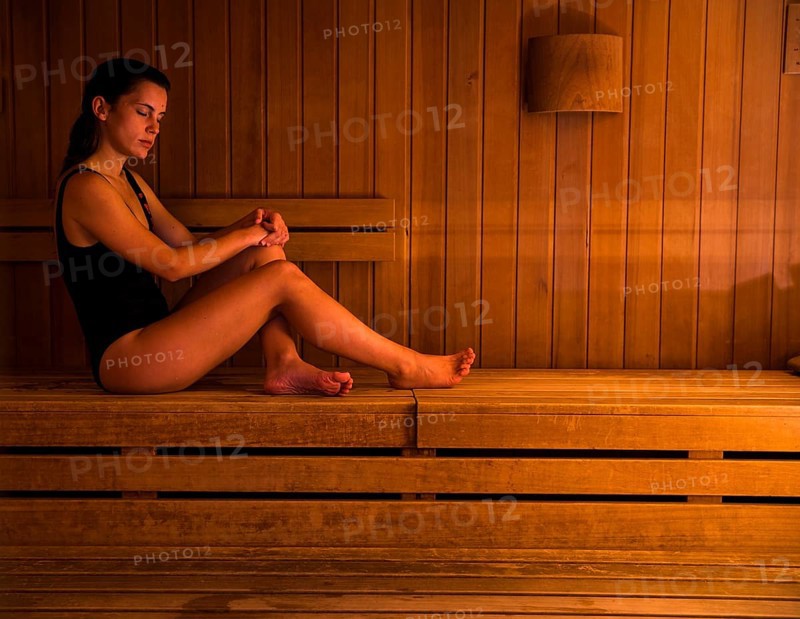 Woman relaxing sauna