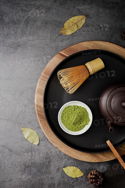 Top view matcha tea powder bamboo whisk