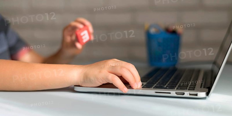 Little online student writing laptop