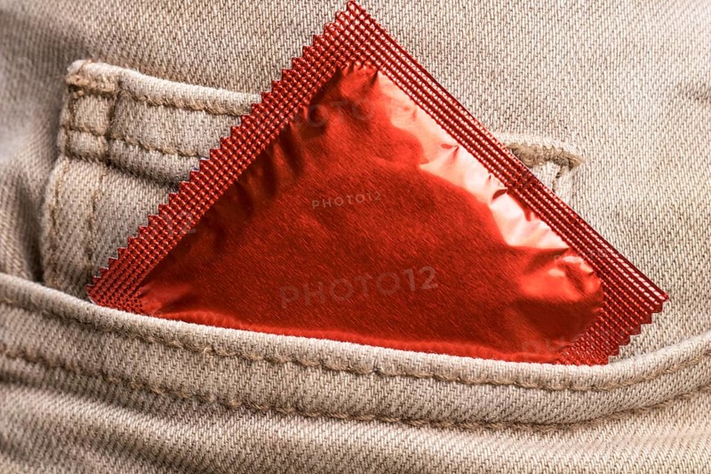 Jeans pocket wrapped condom