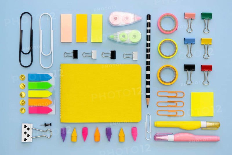 Top view colorful office stationery with paper clips erasers