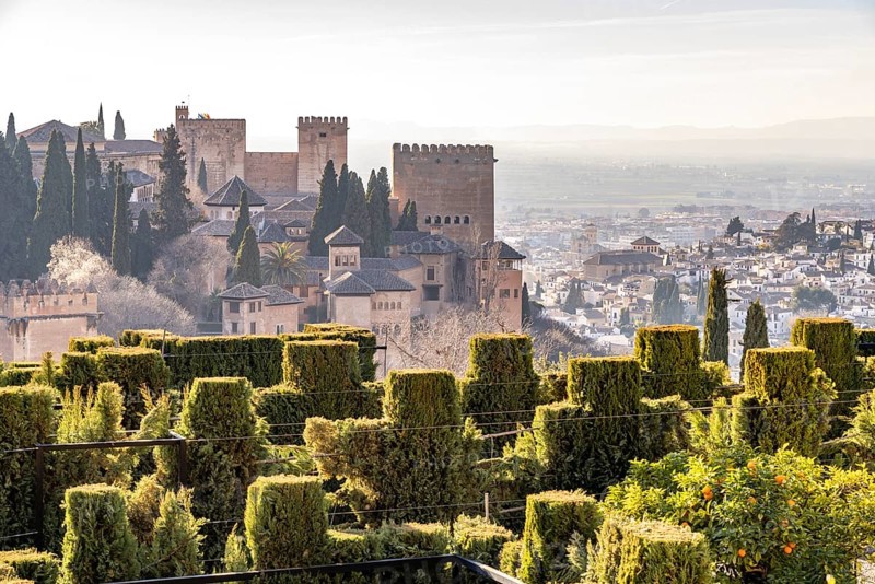 View from the Generalife of the Alhambra castle complex and the city of Granada
