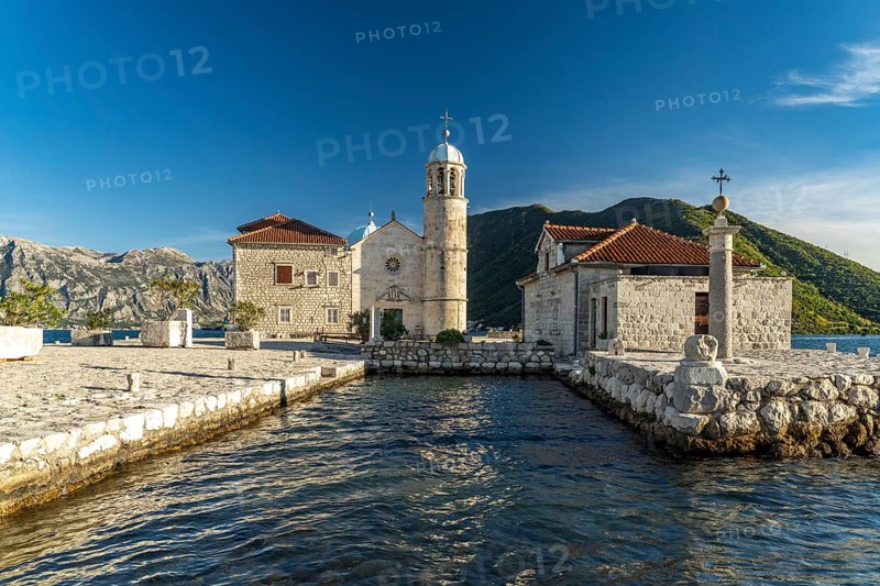The artificial island of Gospa od Skrpjela with the church of St Mary on the rock near Perast on the Bay of Kotor