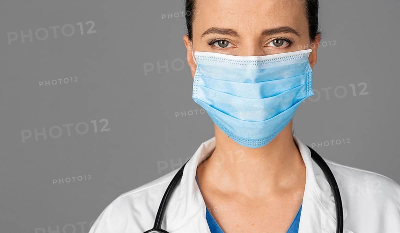 Female doctor hospital wearing mask