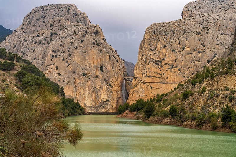 Suspension bridge and waterfall of the via ferrata Caminito del Rey near El Chorro