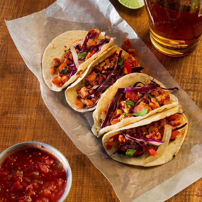 Delicious tacos with sauce arrangement