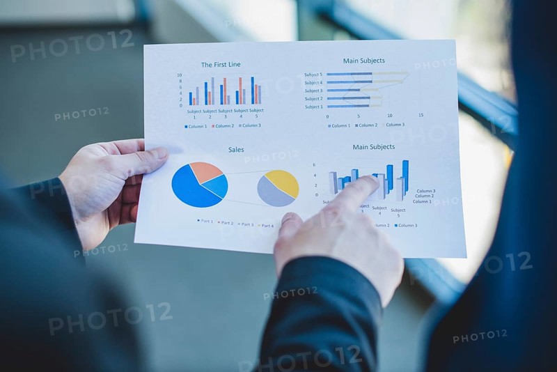 Businessman checking stats