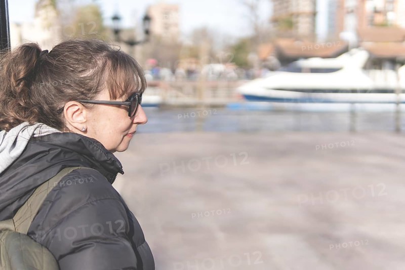 Portrait of a tourist walking along Paseo Victorica