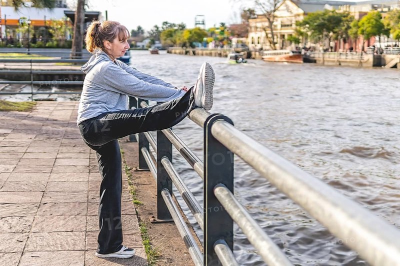Mature woman doing stretching exercise