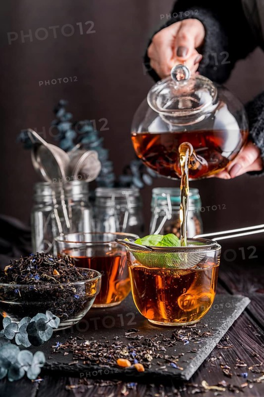 Pouring tea cup