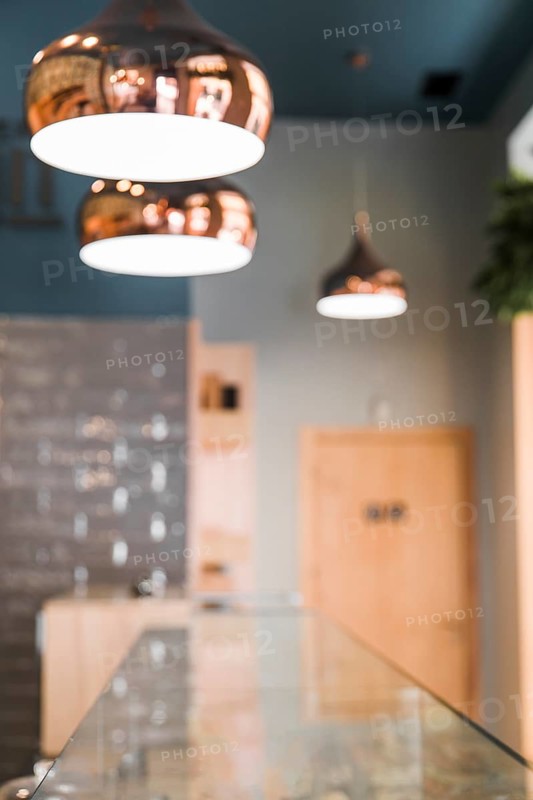 Blur background coffee shop with lighting equipment