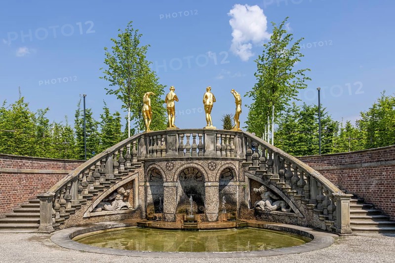Small water features with gilded figures