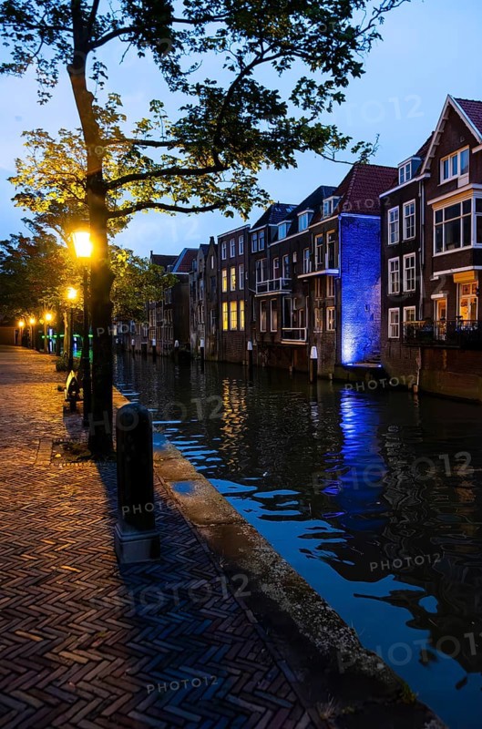 Gracht with old houses in the blue hour in Dordrecht