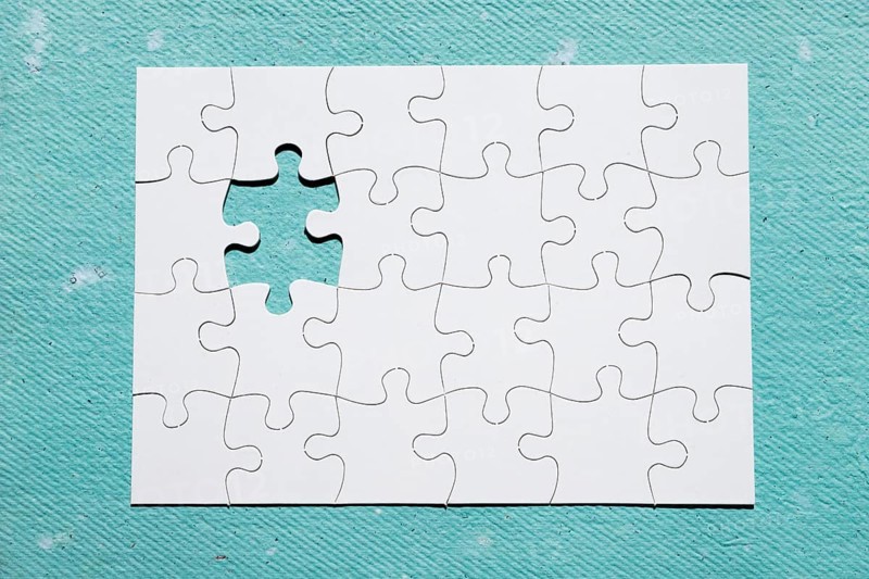 Missing piece puzzle blue textured backdrop