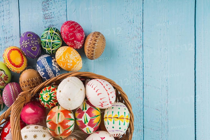 Colored eggs wicker basket