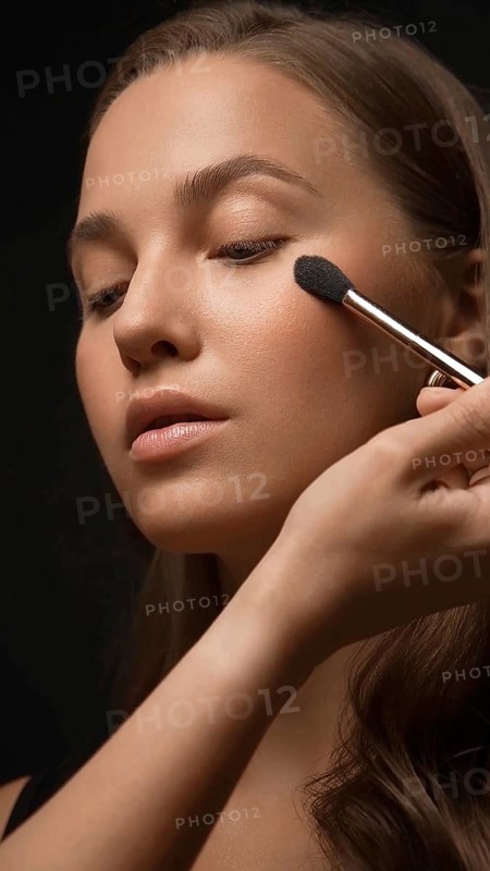 Beautiful young girl with a light natural make-up