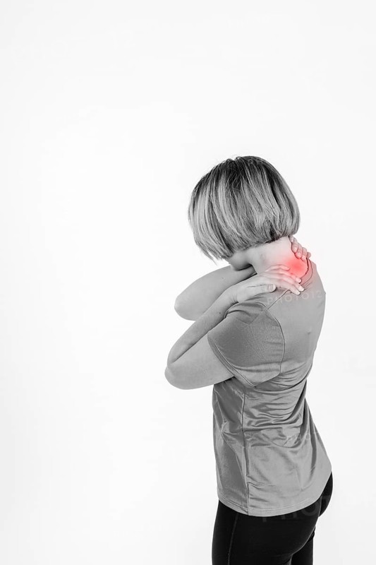 Sporty woman sore neck